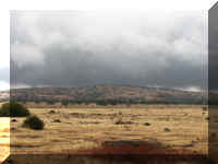 d f1004ca nv_125 rcky fields clouds_1.JPG (32770 bytes)